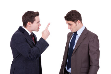 two young businessmen arguing