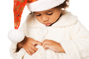 Wall Mural - Cute baby in Christmas hat and fur