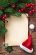© Elena Schweitzer - Letter for santa with old parchment and santa hat
