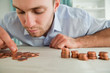 © WavebreakmediaMicro - Businessman counting coins