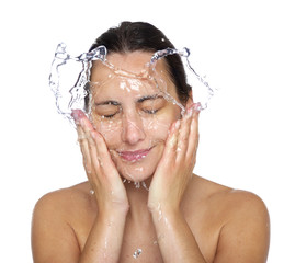 Beautiful wet woman face with water drop