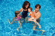 © Iuliia Sokolovska - Happy family with kids in swimming pool. Summer vacation