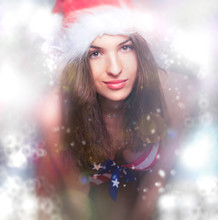 20-25 Years Old Beautiful Woman In Christmas Hat And Swimsuit Wi