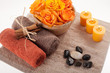 Flowers, towells, stones and candles in natural SPA