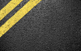 Fototapeta Na ścianę - black asphalt yellow markings