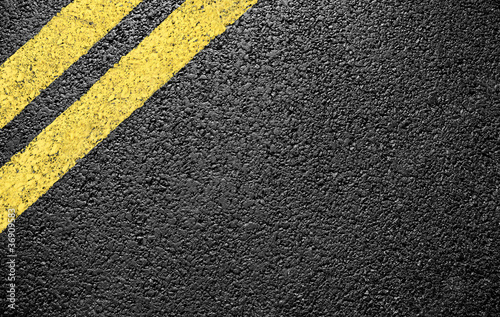 Fotografía black asphalt yellow markings