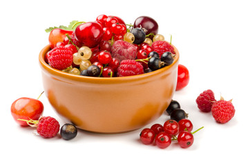 Wall Mural - Mixed berries in bowl isolated on white