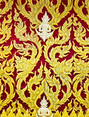 Wall Mural - Thai style molding art in Candle Festival at Ubonratchathani