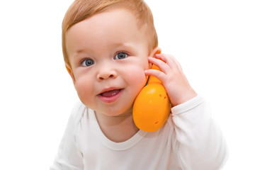 Wall Mural - The one-year-old kid speaks by phone