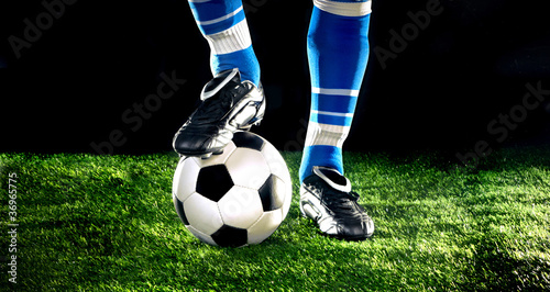 Fototapeta na wymiar soccer ball with feet