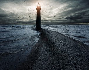 Wall Mural - Stormy sky over lightouse