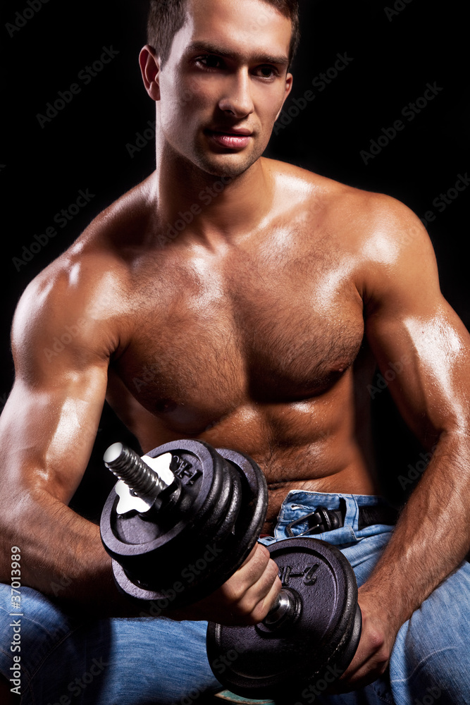 Fitness - powerful muscular man lifting weights - obrazy, fototapety, plakaty 