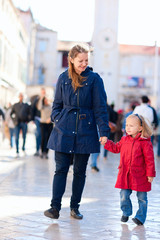 Poster - Mother and daughter in city