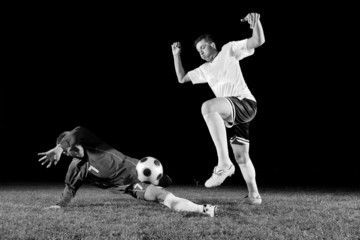 Wall Mural - football players in action for the ball