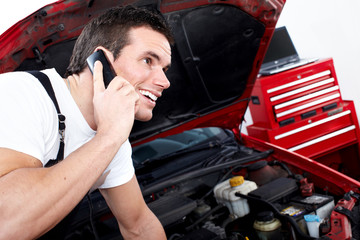 Wall Mural - Auto mechanic calling by phone.