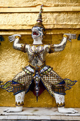 statue of mythical giant guardian in wat phra kaew, thailand