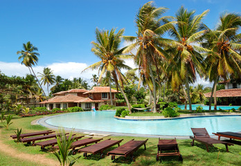 Wall Mural - Swimming pool near villas at the popular hotel, Bentota, Sri Lan