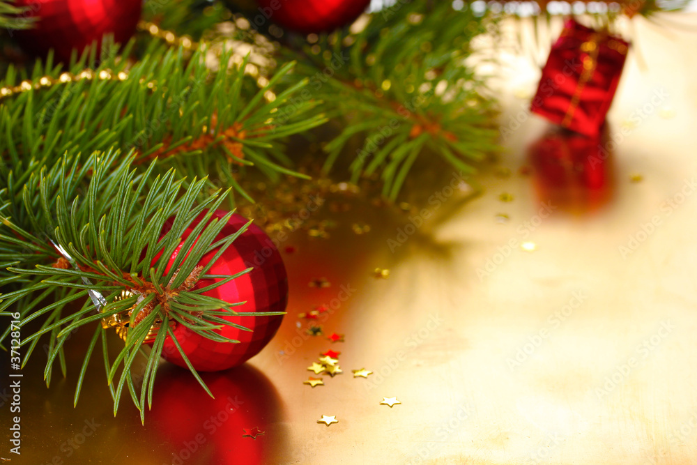 Christmas tree with beautiful New Year's balls on table