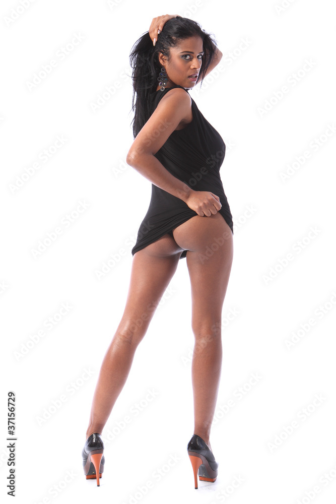 hot legs in short dresses Sensual Girl with Long Legs, Short Black Dress and High Heels Sitting on the Bench. Beautiful Young Woman Wearing Short Skirt Stock Photo