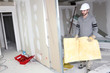 Builder carrying wall insulation