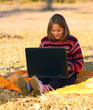© Szasz-Fabian Erika - Girl sitting outdoors with laptop