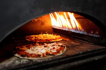 Pizza baking in the oven