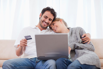 Poster - Happy couple shopping online