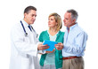 © grinny - Doctor and patient senior couple.