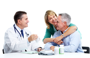 Canvas Print - Doctor and patient senior couple.