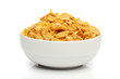Pile of cornflakes on a bowl over white background