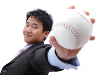 Business man take baseball with Self confident smile