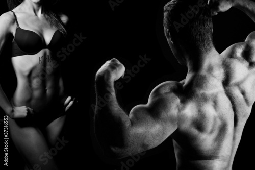 Nowoczesny obraz na płótnie man and a woman in the gym