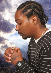 Wall Mural - Black man praying