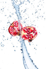 Canvas Print - Fresh pomegranate in water splash