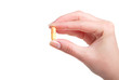 pill in a hand on white background