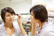 © JackF - woman testing the mascara