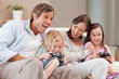 © WavebreakmediaMicro - Laughing family playing video games