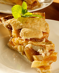 Wall Mural - apple pie with mint garnish.