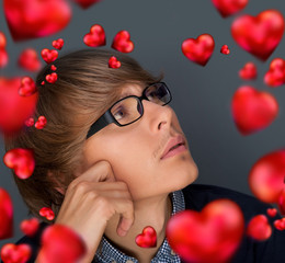 Wall Mural - image of young man thinking of his plans about valentine day and