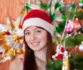 girl in red Christmas hat