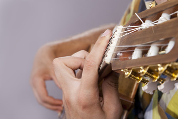 Really great shot capturing detail of a guitarist