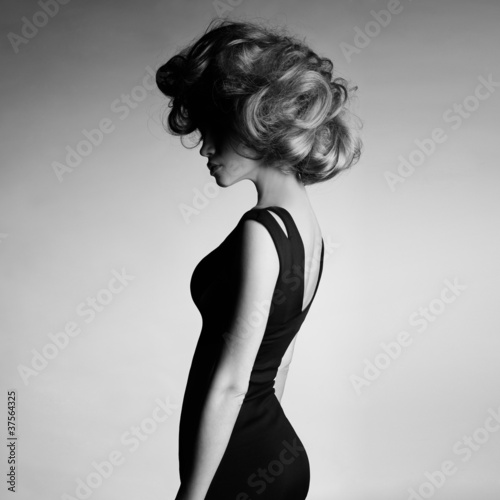 Fototapeta dla dzieci Young beautiful lady in elegant dress