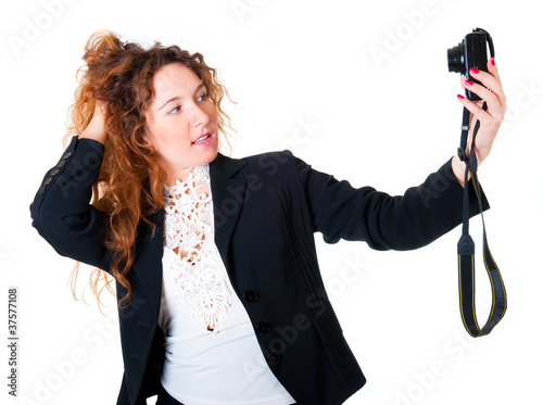 Cuadros en Lienzo Young woman makes self-portraits