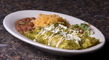 Mexican Enchiladas On White Plate