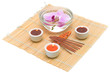 © evgenyi - candles, incense sticks and orchid on a white background closeup