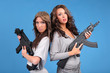 © Peter Kim - Beautiful women holding automatic rifles