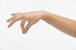 female hand holds, picking, isolated on white background