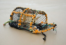 Lobster Pot Laying On Beach