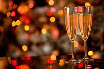 Champagner on Glass Table with Bokeh background