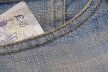 Five Pound Note In Jeans Pocket.